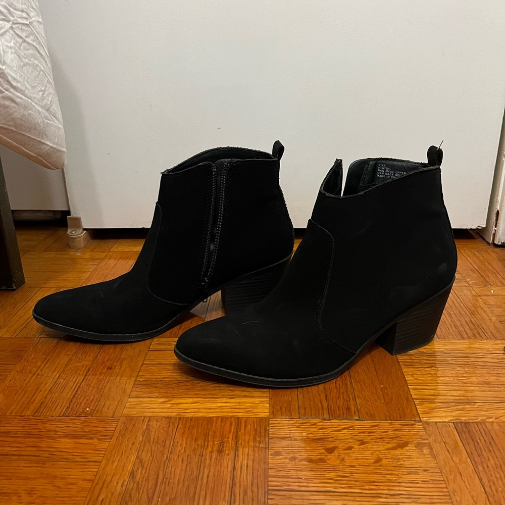 Black suede boots with black rhinestones on back.